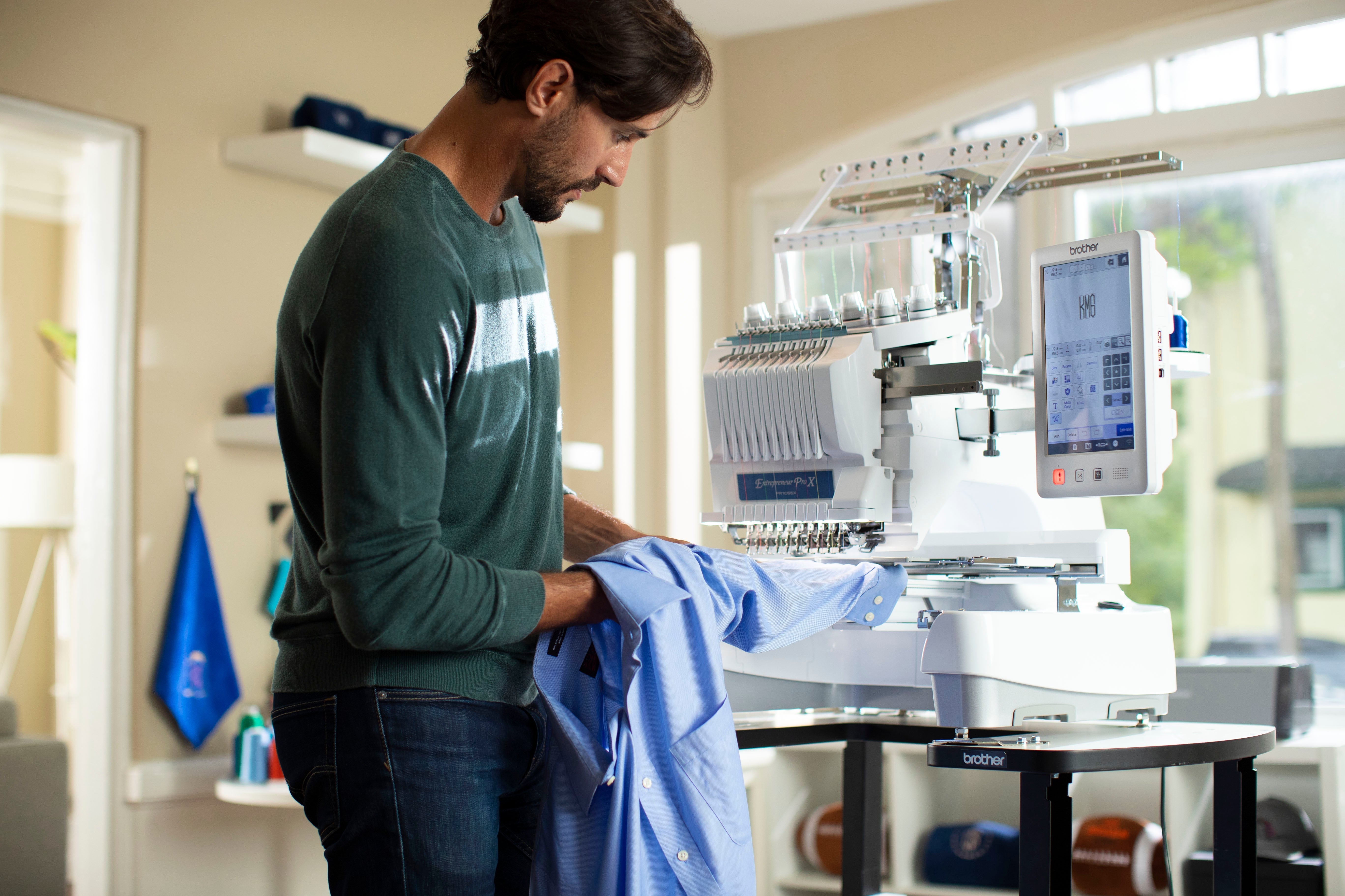 Using an embroidery sewing machine to stitch a custom design onto a shirt